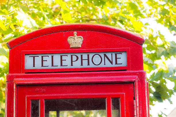 istock Traditional Red Phone Booth in London 450913125