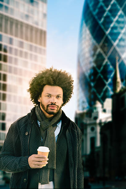 istock Hip young man going to work early downtown London 450920349