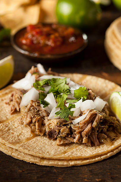 istock Pock tacos with salsa in the background 450949659