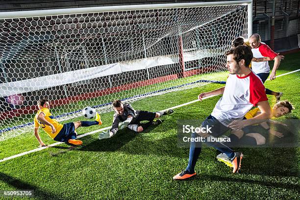 Football Match In Stadium Strikers Goal Stock Photo - Download Image Now - Soccer, Teenager, 2014