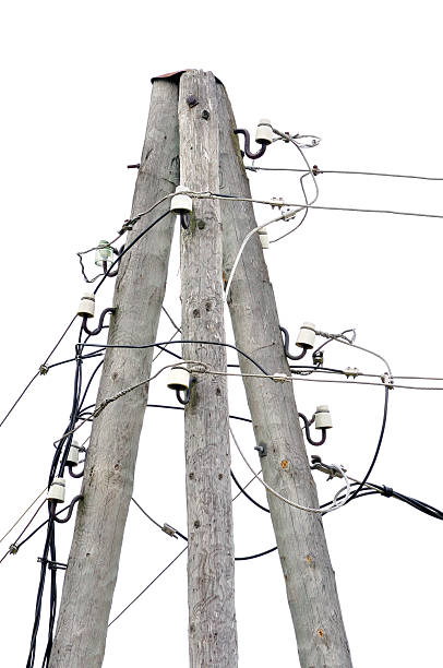 istock Old weathered aged wooden electricity pole post, wire hub cables 450953973
