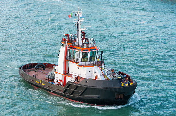 istock Tug boat alone cruising but not towing 450954183