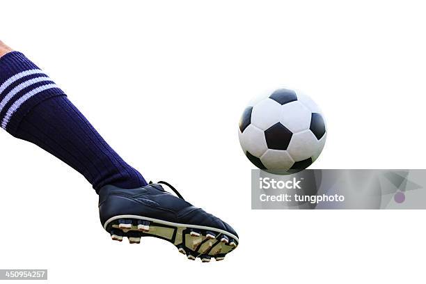 Foot Kicking Soccer Ball Isolated With Clipping Path Stock Photo - Download Image Now