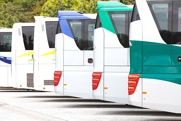 istock Tourist buses on a car park 450963885