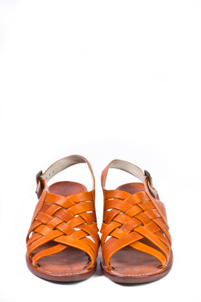 istock Women orange leather shoes isolated on white background 450992127