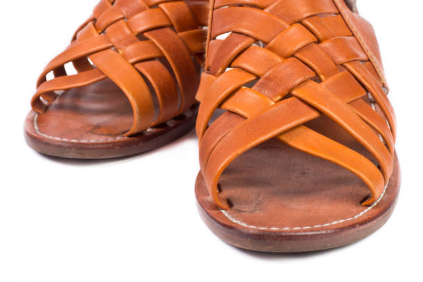 istock Women orange leather shoes isolated on white background 450997883
