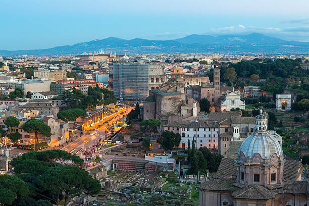istock Coliseum at dusk with scaffolding, Rome Italy 451009347