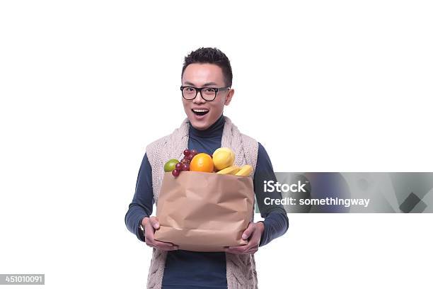 Asian Men Buy Fruit Stock Photo - Download Image Now - Holding, Men, Only Men