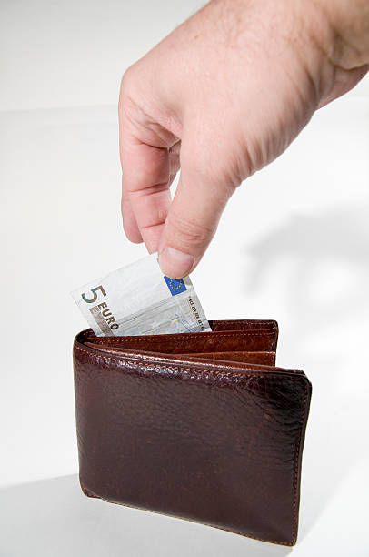 istock Euro purse and hand 451013477