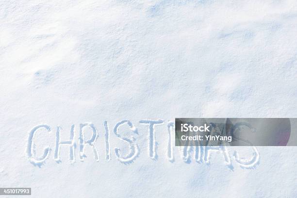Christmas Word Written On White Winter Snow With Copy Space Stock Photo - Download Image Now