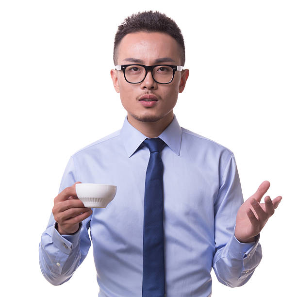 istock Young Asian businessman drinking coffee 451018039