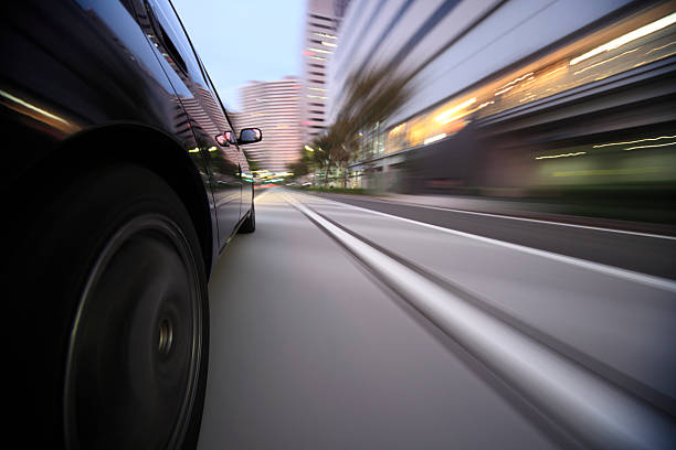 istock Driving in the sunset city 451044033