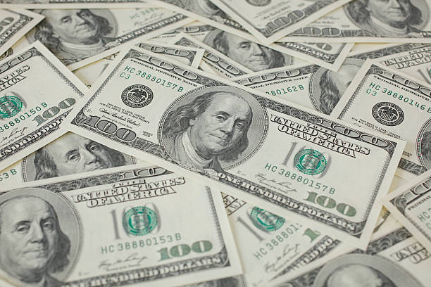 istock Japanease 10000 yen and 100 Dollar . 451044149