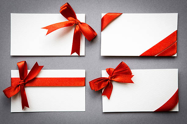 istock Set of cards with red ribbons bows 451046401