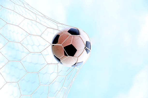 istock Soccerball in net 451047645