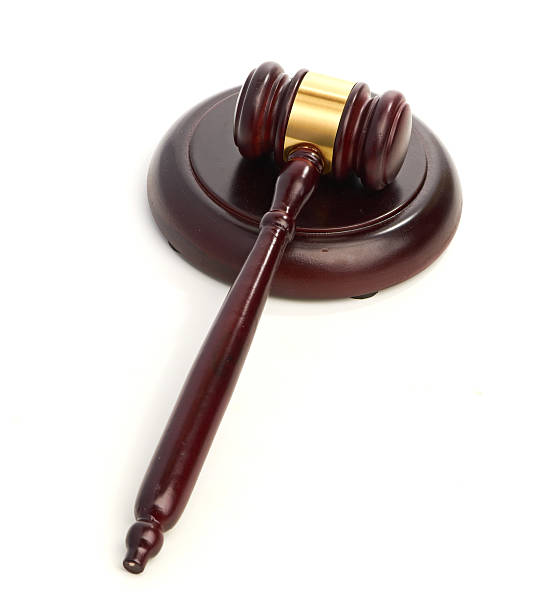 istock Judge's gavel isolated on white 451057421