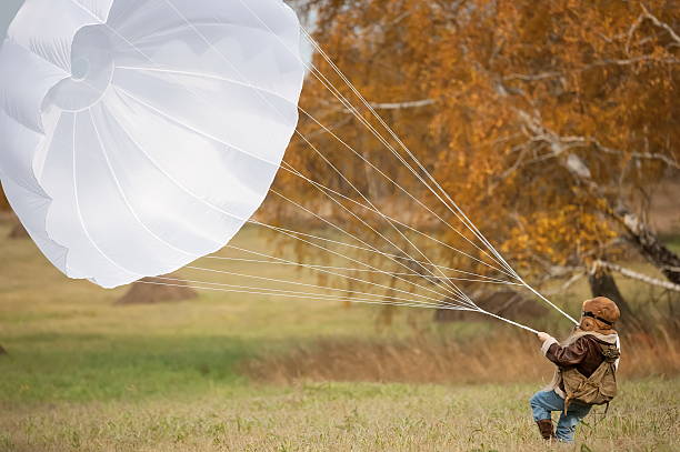 istock Young female pilot parachute 451057659