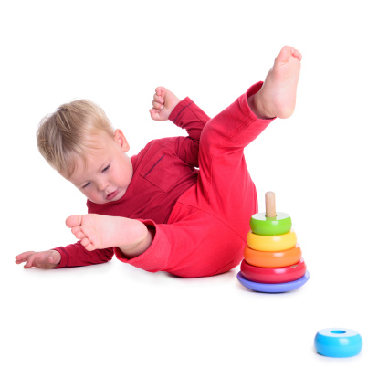 caucasian baby fell. isolated on white background. baby 1 year