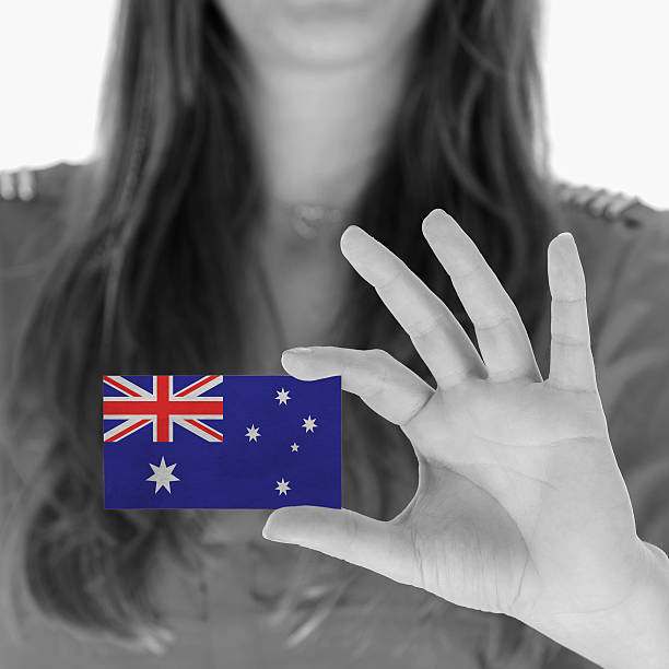 istock Woman showing a business card 451060277