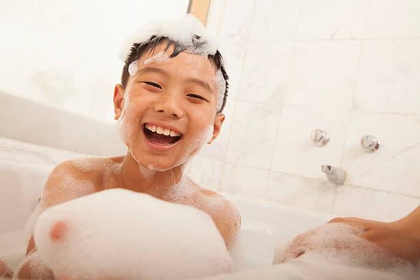 istock Close-up of Kid in Bubble Bath 451061391