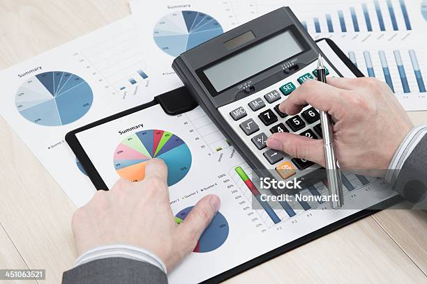 Man Hand With Business Report Stock Photo - Download Image Now - Adult, Analyzing, Banking