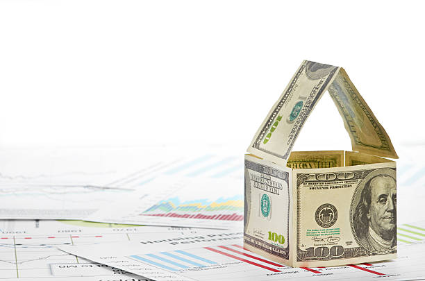 istock House of dollars. on chart background 451066197
