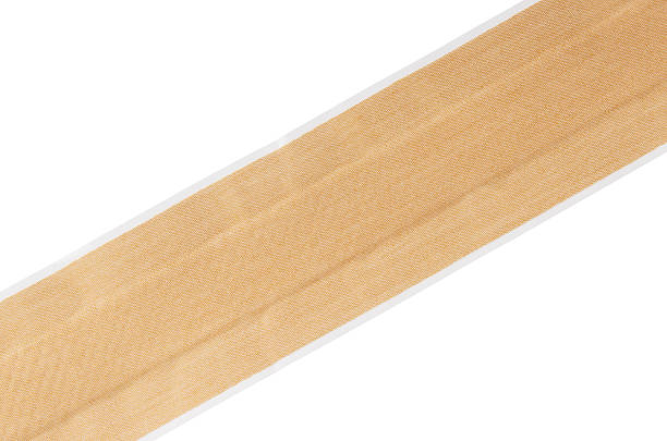 istock Roll of bandaid adhesive plaster isolated 451066367