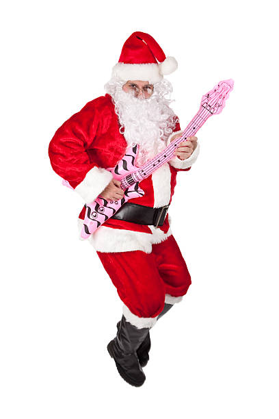 istock Santa Jumping Playing Toy Guitar 451067023
