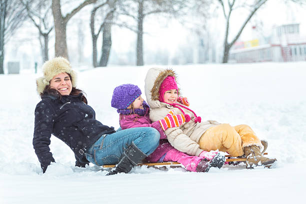 istock Happy family enjoying in winter 451067375