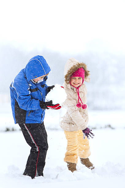 istock Happy family enjoying in winter 451067381