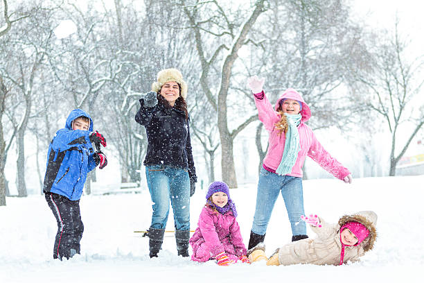 istock Happy family enjoying in winter 451067449