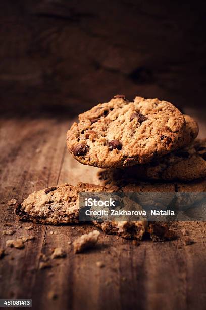 Chocolate Chip Cookies On Wooden Background Stock Photo - Download Image Now - Chocolate Chip Cookie, Backgrounds, Baked
