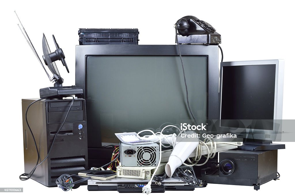 Old and used electric home waste. Old and used electric home waste. Obsolete pc computer, telephone, CRT monitor, DVD. E-Waste Stock Photo