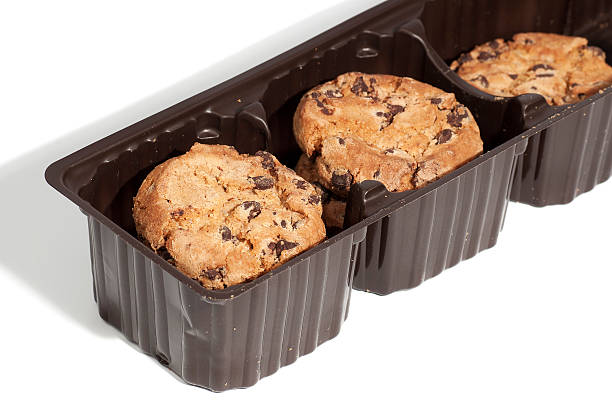 cookies packaged in a brown plastic container stock photo