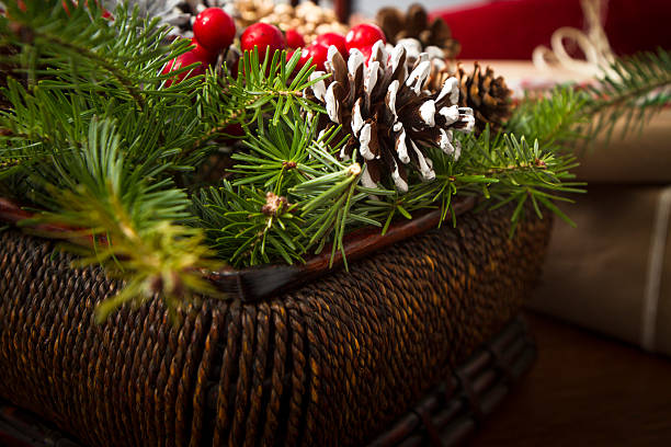 istock Christmas Evergreens In A Brown Basket 451133691