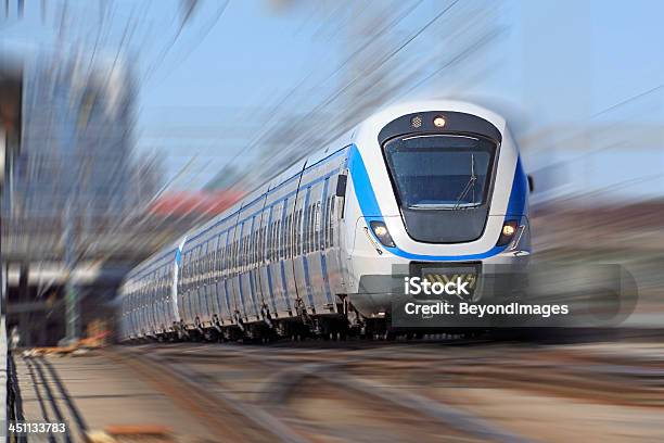 Electric Commuter Train Leaving Station Blurred Motion Stock Photo - Download Image Now
