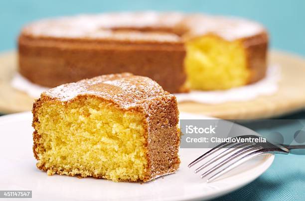 Piece Of Cake With Icing Sugar Stock Photo - Download Image Now - Cake, Yogurt, Softness