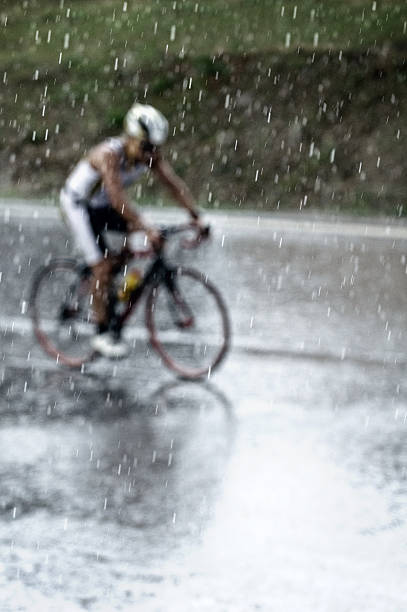 istock Cycling In The Rain 451148197