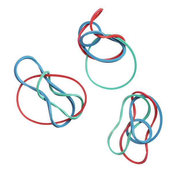 istock Red, green and blue elastic rubber bands isolated on white 451154915