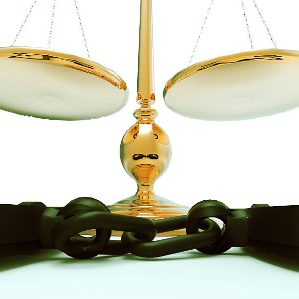 istock Scales of justice and handcuffs 451155177