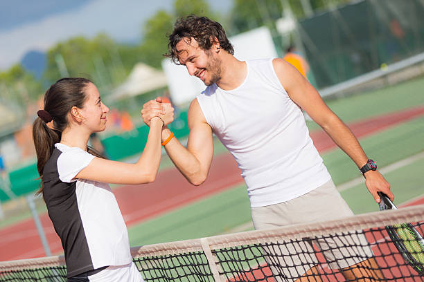 istock Tennis Players Giving Handshake 451161283