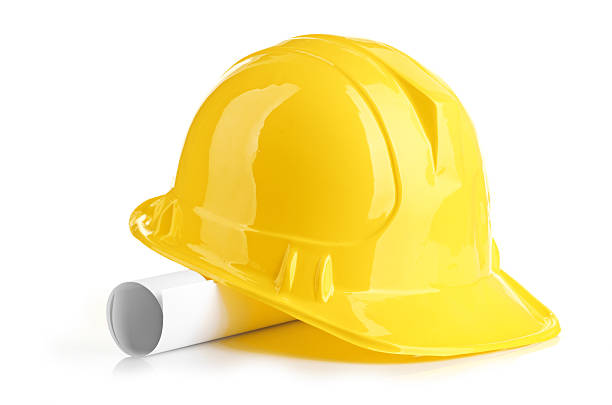 istock yellow helmet and roll paper 451171341