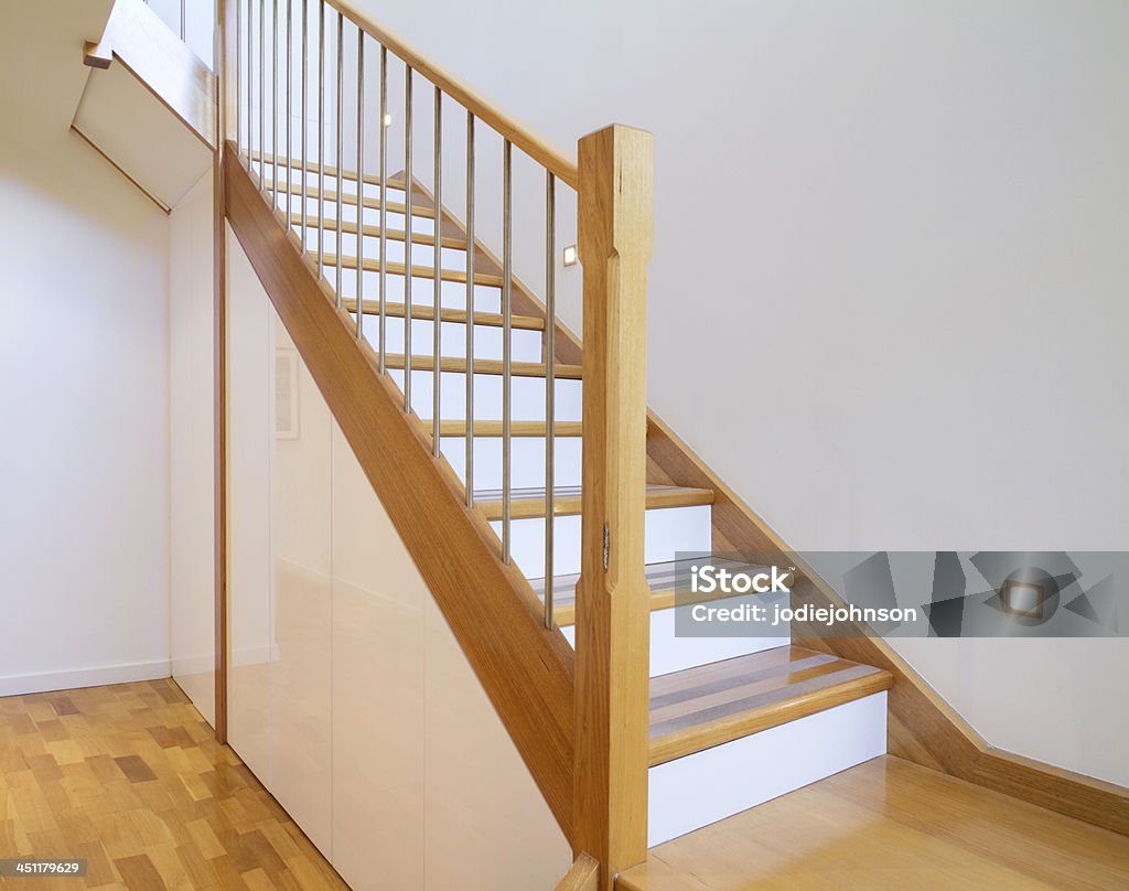 Oak and white stair case home interior European Oak starcase with white risers in a contemporary architect designed home Staircase Stock Photo