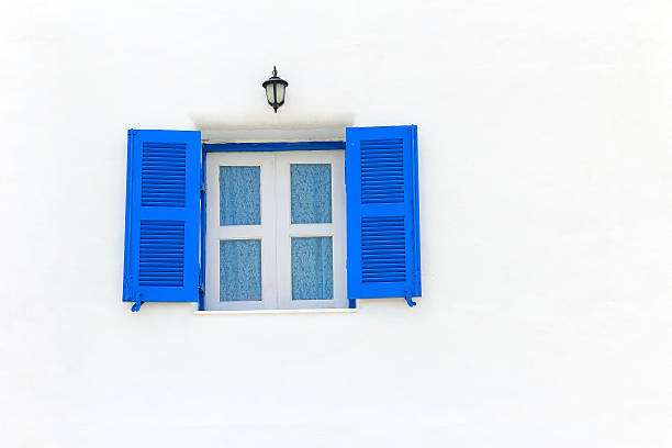 istock elegant house window and lamp 451182381