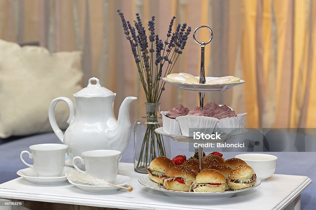 Afternoon tea Afternoon tea with sandwiches and cakes Cup Stock Photo