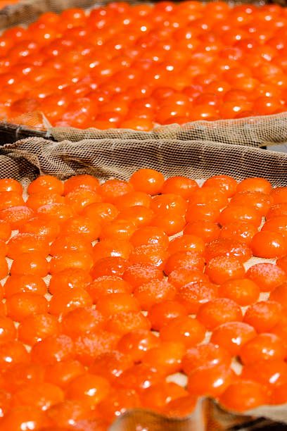 istock Salted duck egg yolks on Chinese bamboo trays 451188221