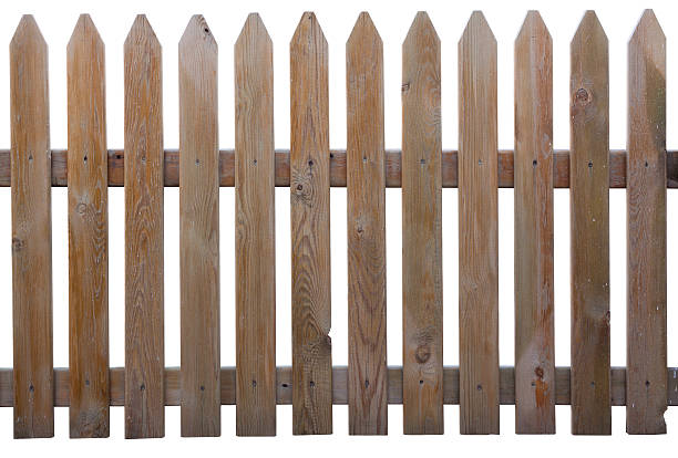 istock Brown wooden picket fence panel 451188923