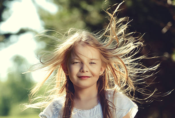 7,988 Girl Hair Blowing In Wind Stock Photos, Pictures & Royalty-Free  Images - iStock | Woman hair blowing in wind