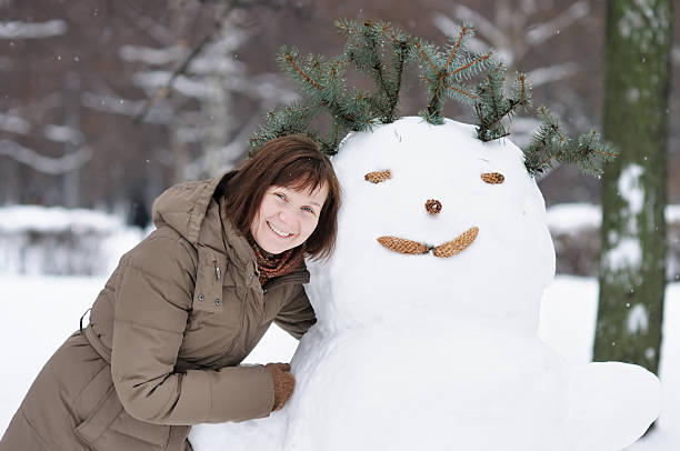 istock Woman having fun in winter 451245577