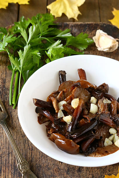 istock roasted mushrooms in white bowl 451246123